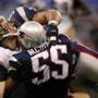 FEBRUARY 3, 2002: NEW ORLEANS, LA: GLOBE STAFF PHOTO: Barry Chin. Willie McGinest and Richard Seymour combine to sandwich Kurt Warner late in the 4th quarter. -- Library Tag 02042002 Super Bowl / pats02